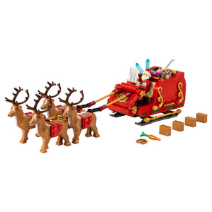 LEGO Santa's sleigh with reindeer and presents on a white background