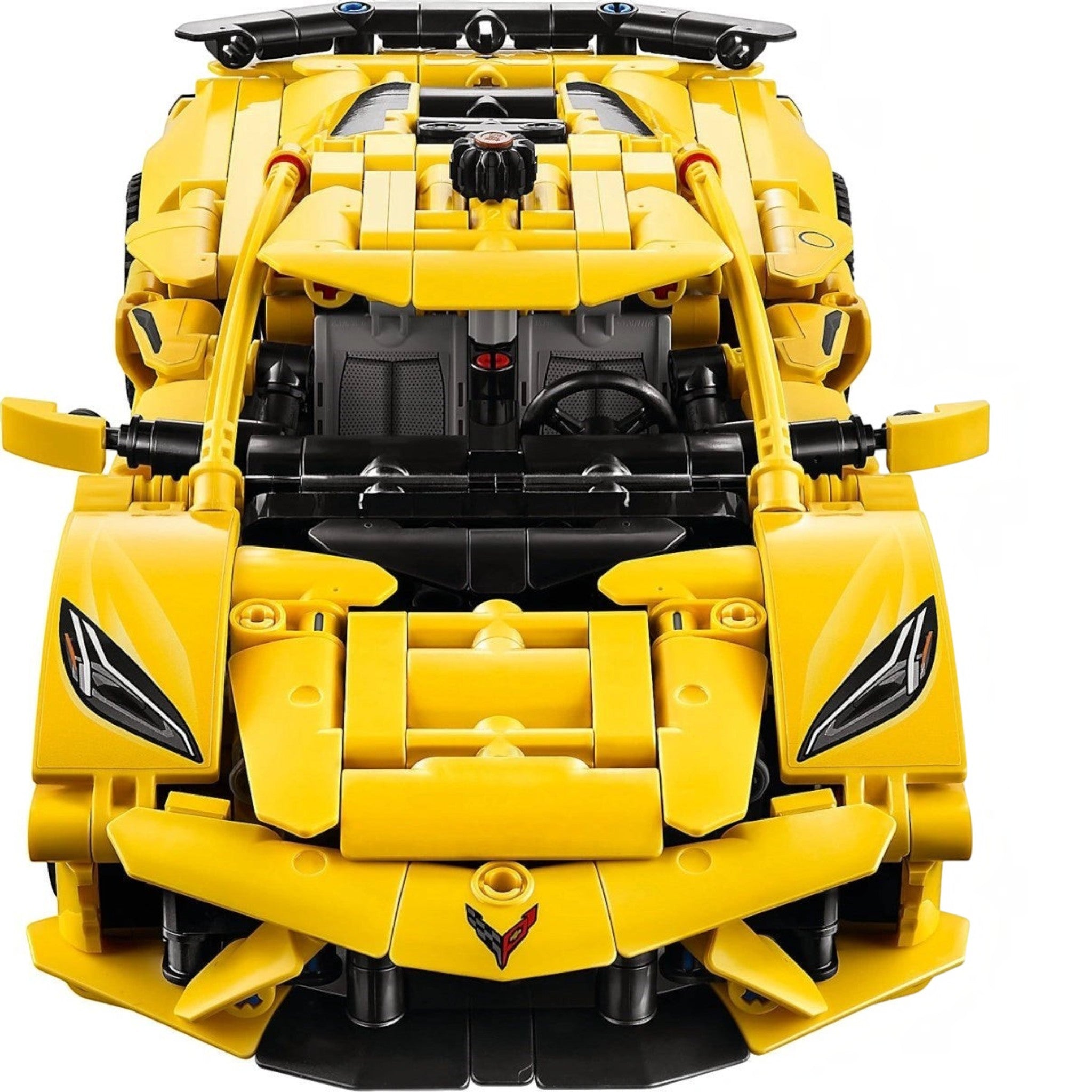 Yellow toy car with black accents on a white background