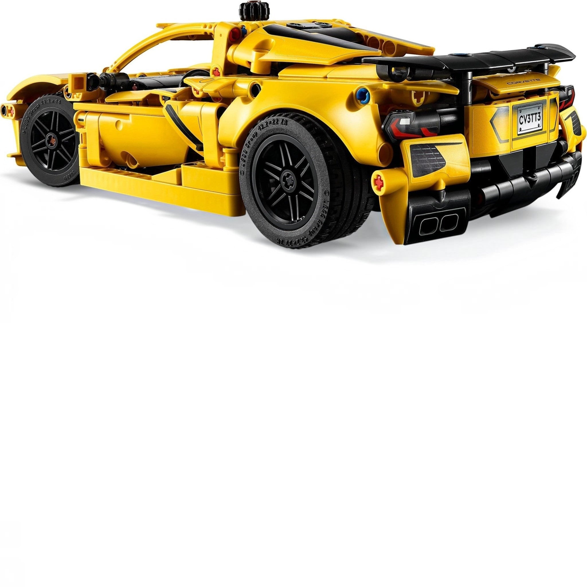 Yellow toy car model on a white background