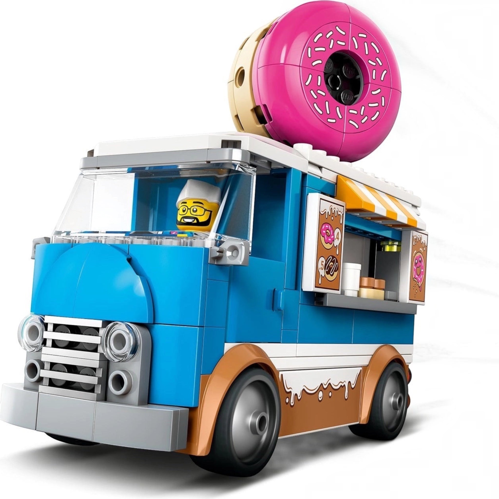 Toy ice cream truck with a pink donut on top against a white background