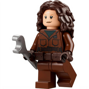 LEGO figure of a character with brown hair, wearing a brown outfit and holding tools.