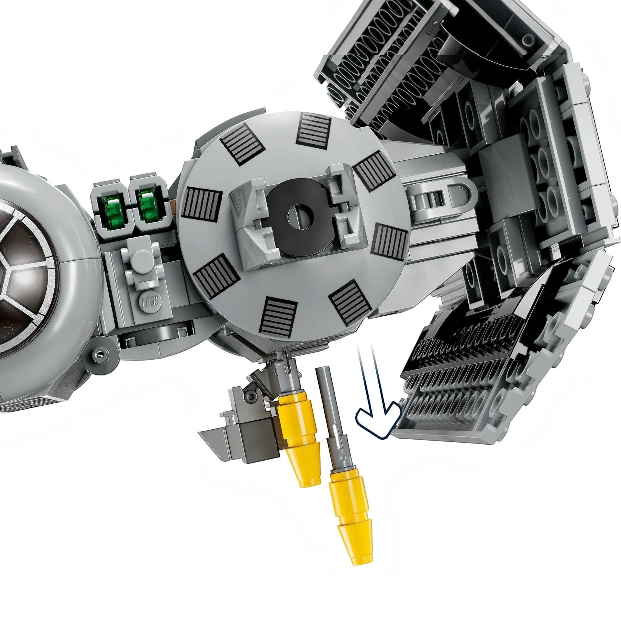 Close-up of a LEGO model of a spaceship with detailed components on a white background