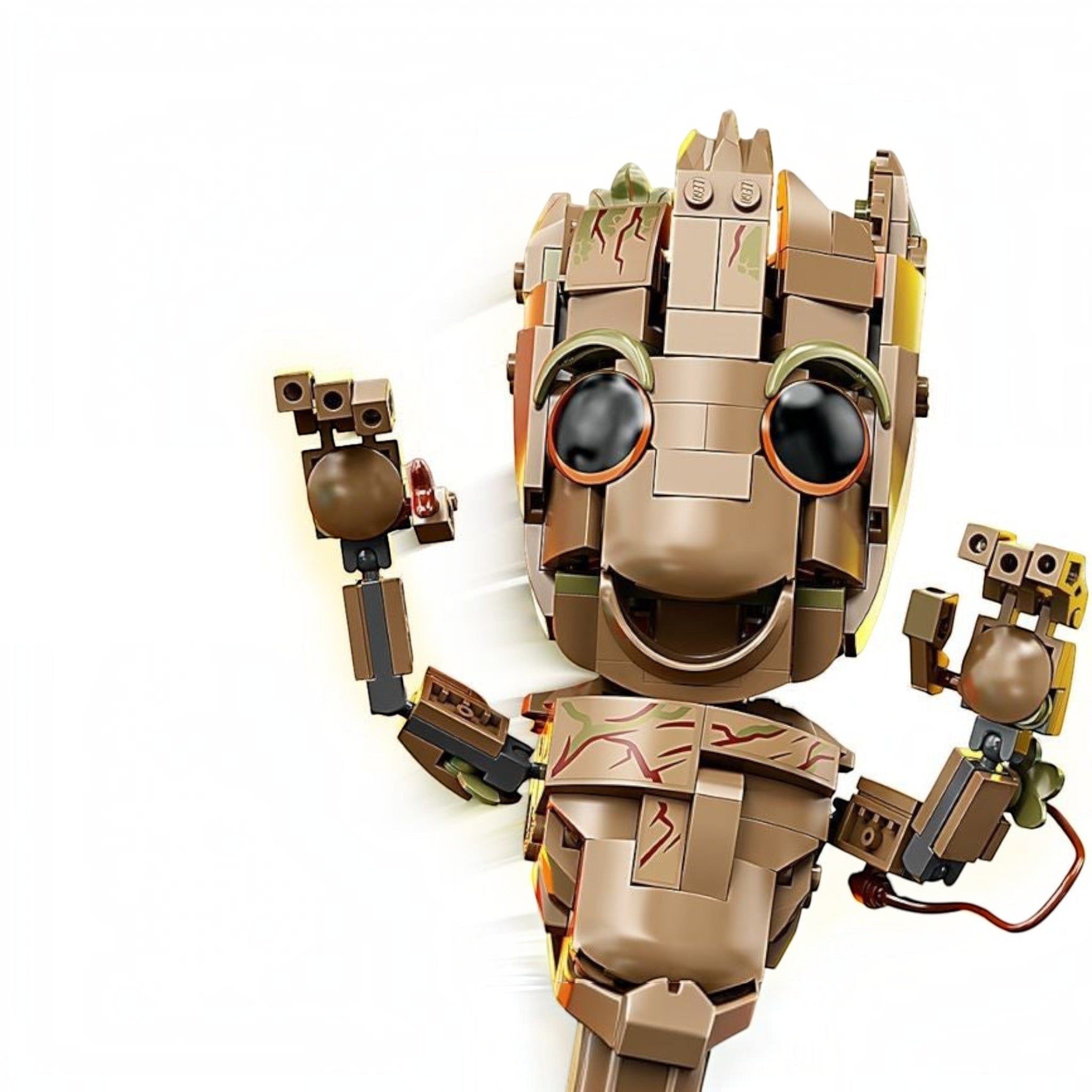 Toy robot model made from interlocking bricks on a white background