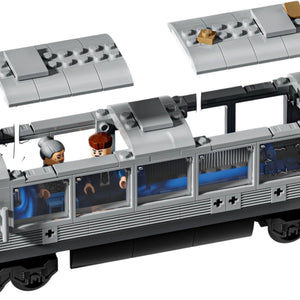 Toy train set with detailed compartments on a white background