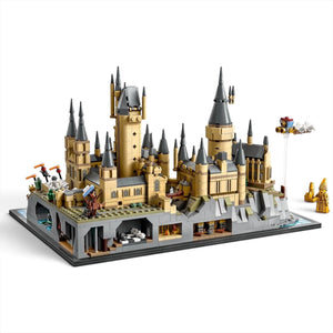 [built-white] Detailed LEGO model of a castle with multiple towers and structures on a white background