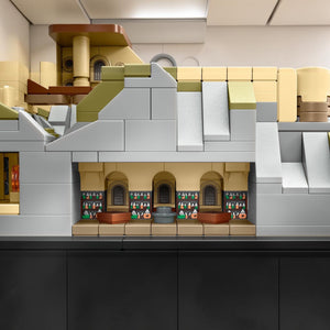 Close-up of a detailed model made from interlocking bricks with a room interior.