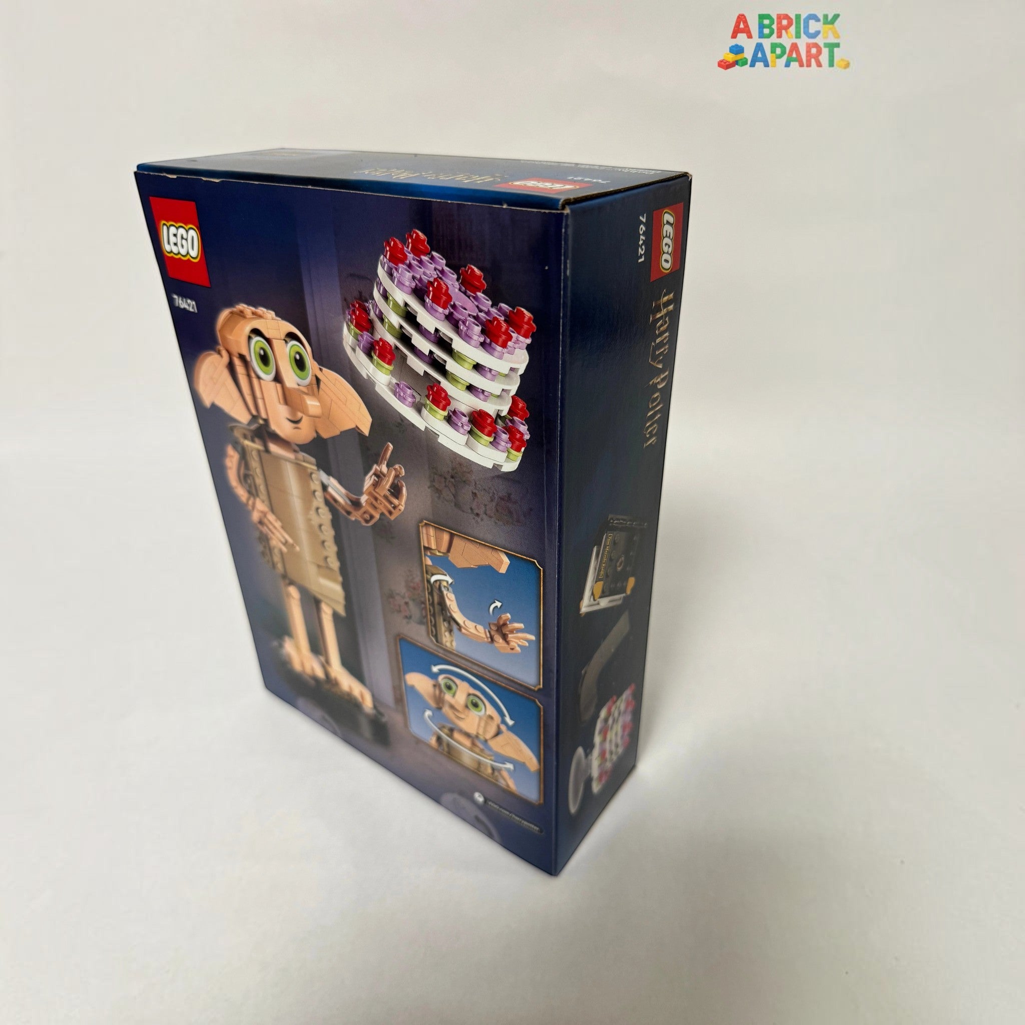LEGO box featuring a character with a cake on a white background