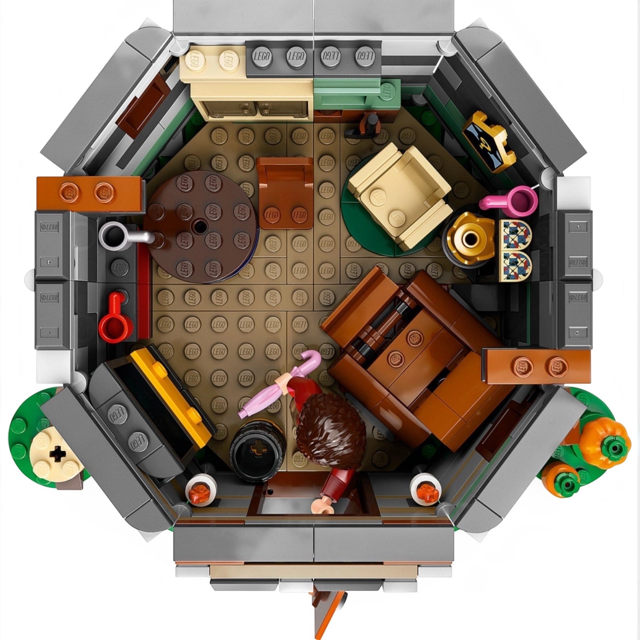 Top-down view of a detailed LEGO model with various elements on a white background