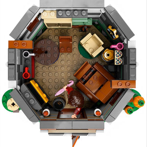 Top-down view of a detailed LEGO model with various elements on a white background