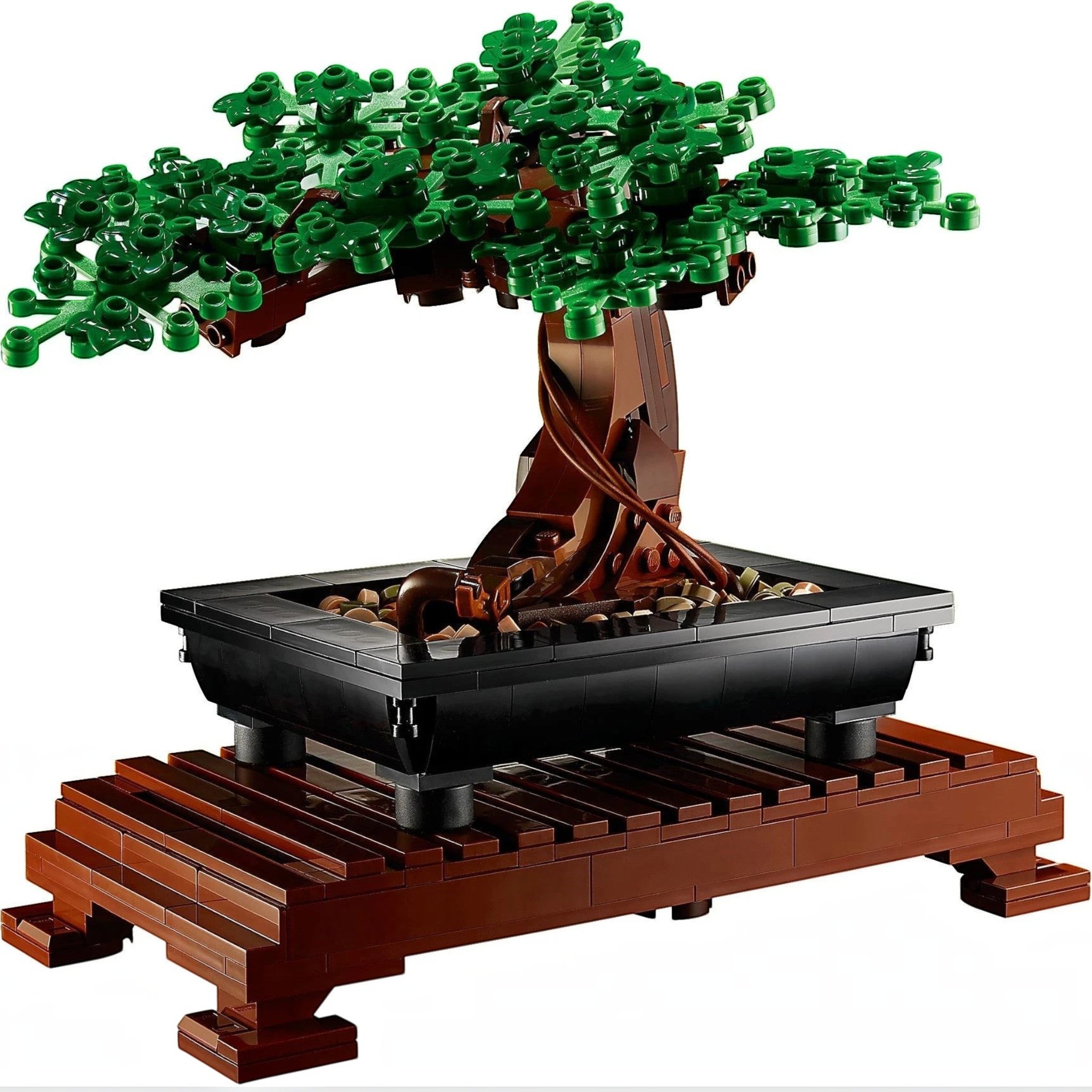A Brick Apart LEGO Bonsai Tree model with green leaves, brown trunk, and black rectangular pot on a wooden stand.