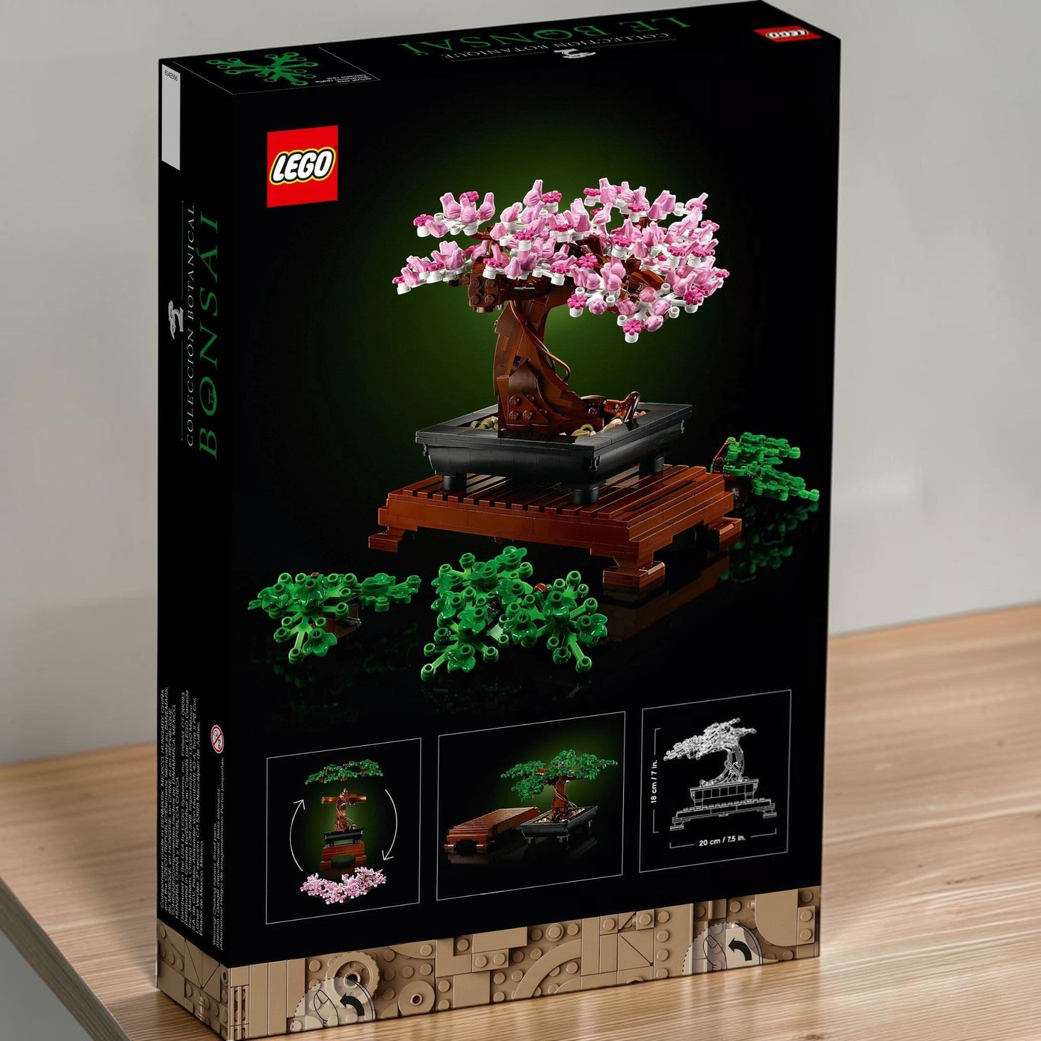 A Brick Apart LEGO Icons Bonsai Tree set box showing the model with pink cherry blossoms and extra green leaf pieces.
