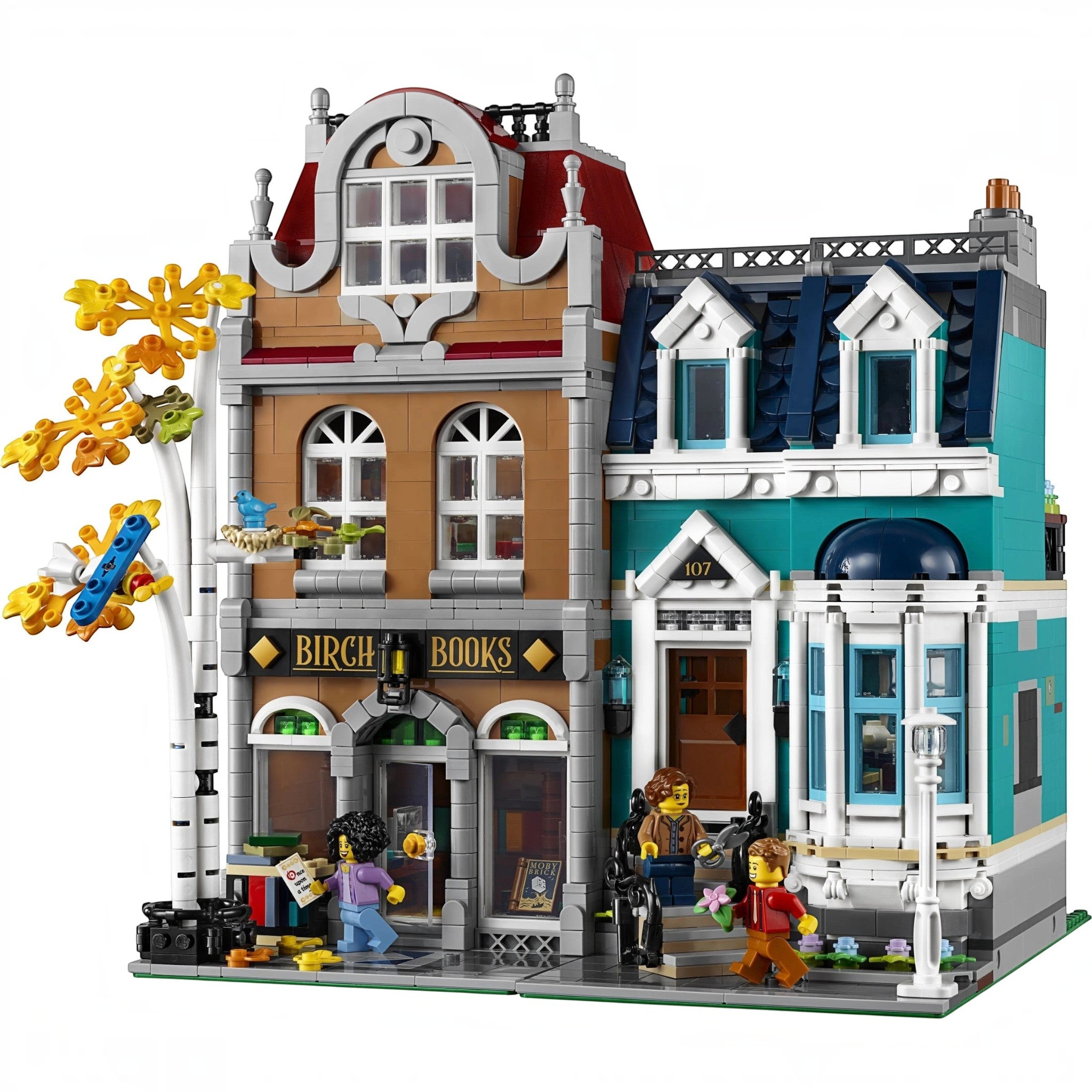 A Brick Apart LEGO Creator Expert Bookshop modular building set with a birch tree, minifigures, and detailed facade.
