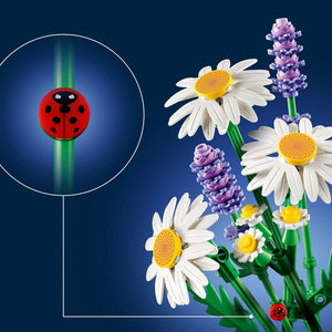 A Brick Apart LEGO Botanicals Daisies set featuring white daisies, purple lavender, green stems, and a red ladybug.