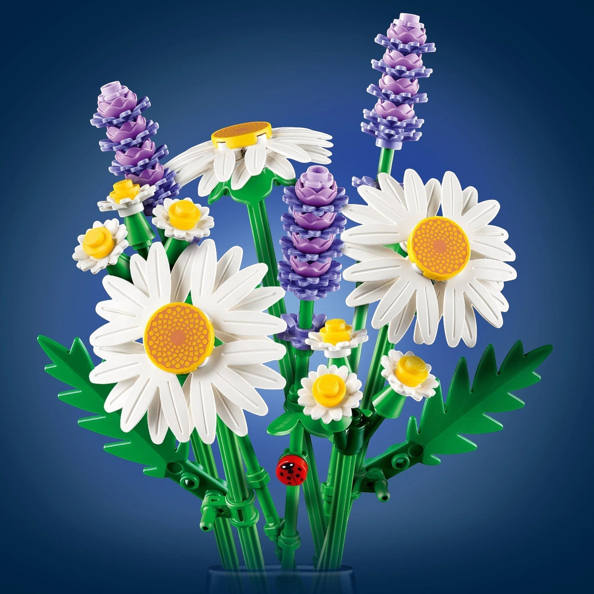 A Brick Apart LEGO Botanicals Daisies bouquet with white flowers, purple lavender, green stems, and a small ladybug.