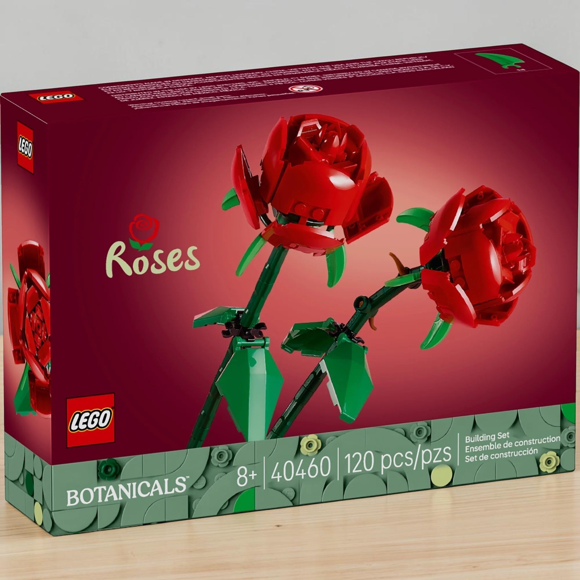 A Brick Apart LEGO Botanicals Roses building set box featuring two buildable red roses with green stems and leaves.