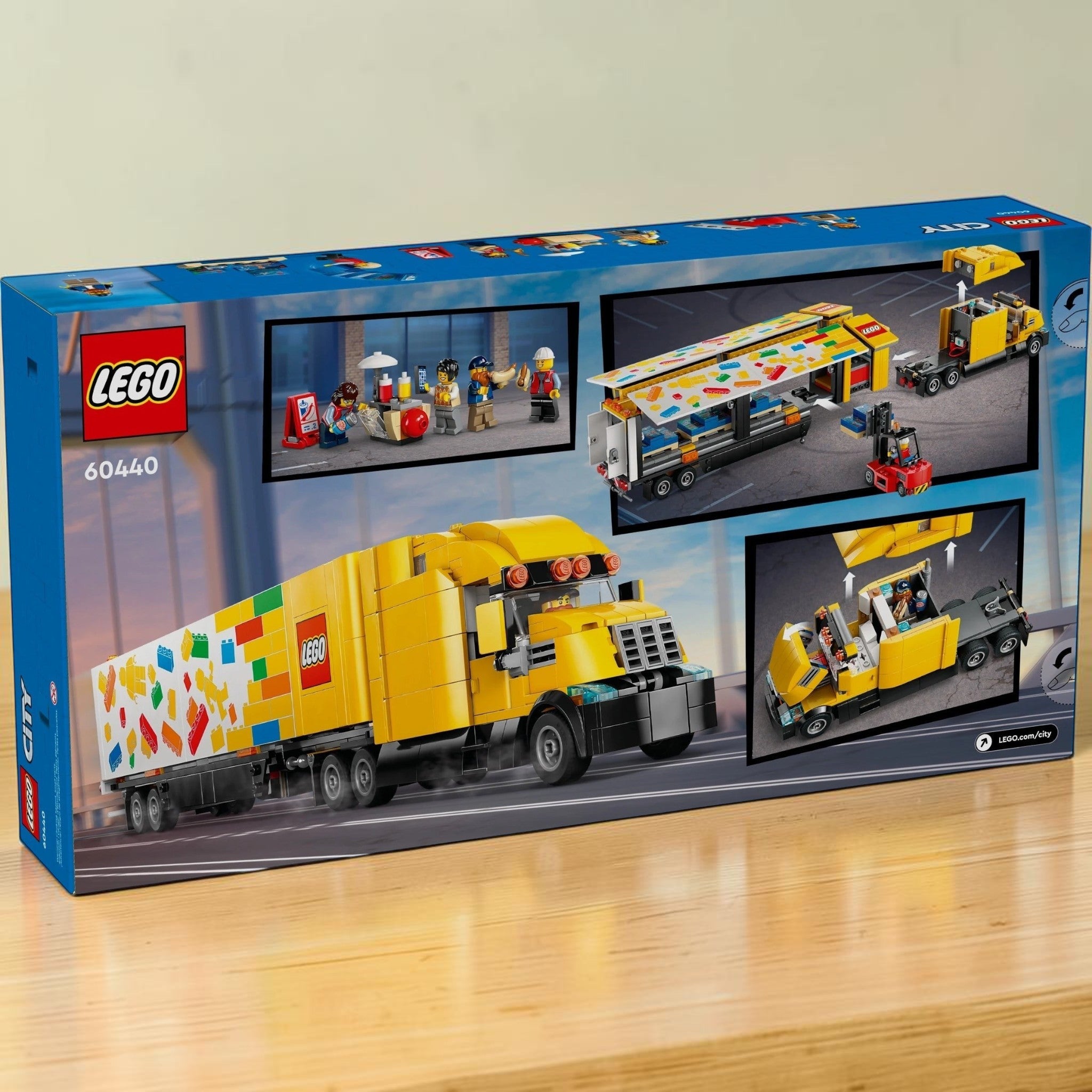 A Brick Apart LEGO City Delivery Truck 60440 box showing the yellow semitruck, forklift, and minifigures.