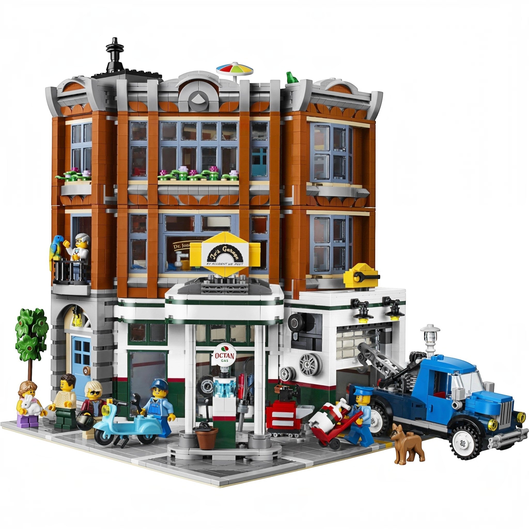 A Brick Apart LEGO Creator Expert Corner Garage modular building set with a gas station, animal clinic, and apartment.