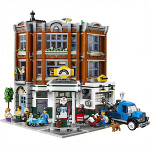 A Brick Apart LEGO Creator Expert Corner Garage modular building set with a gas station, animal clinic, and apartment.