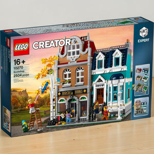 A Brick Apart LEGO Creator Expert Bookshop 10270 set box featuring a detailed 3-story modular building with minifigures