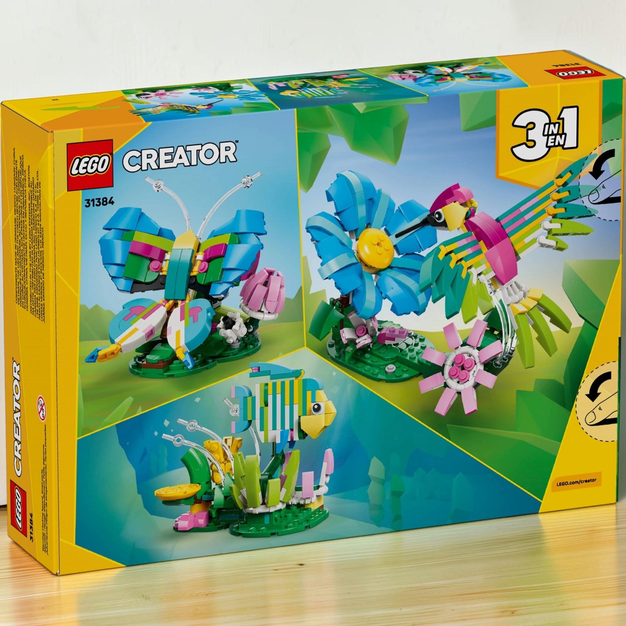 A Brick Apart LEGO Creator 3-in-1 Colourful Hummingbird set box showing hummingbird, butterfly, and fish builds.