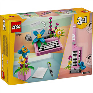 A Brick Apart LEGO Creator 3in1 typewriter set box showing a pink typewriter with flowers, keytar, and flowerpot.