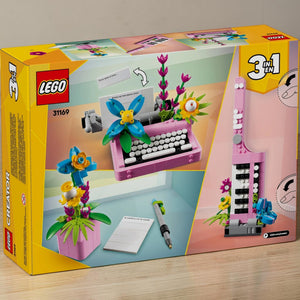 A Brick Apart LEGO Creator 3in1 Typewriter set box showing a pink typewriter, keytar, and flowerpot builds.