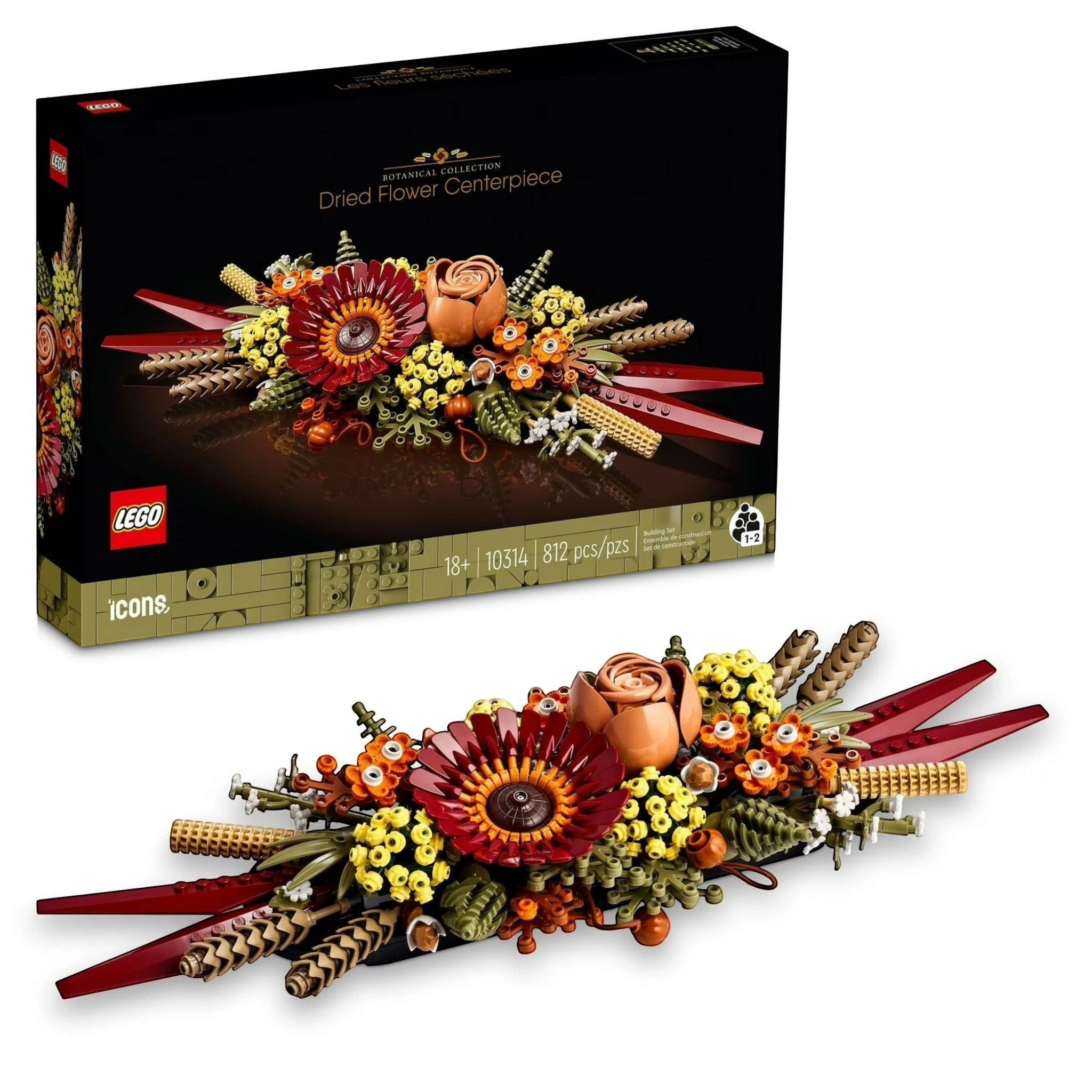 A Brick Apart LEGO Icons Dried Flower Centrepiece featuring fall-inspired plastic floral blooms and wheat stalks.
