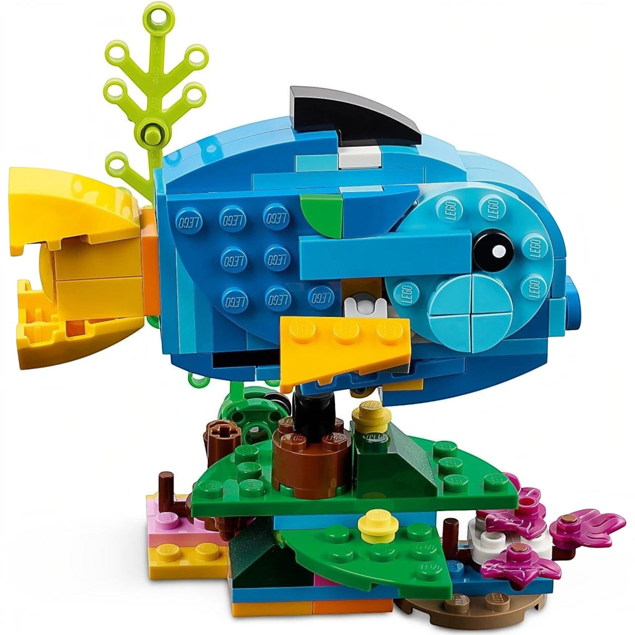 A Brick Apart LEGO Creator 3in1 exotic fish build with blue, yellow, and green bricks on a coral reef base.
