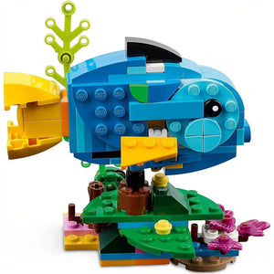 A Brick Apart LEGO Creator 3in1 exotic fish build with blue, yellow, and green bricks on a coral reef base.