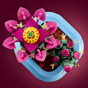 A Brick Apart LEGO Botanicals Flowering Cactus set featuring two green cacti with vibrant pink flowers in a blue pot.
