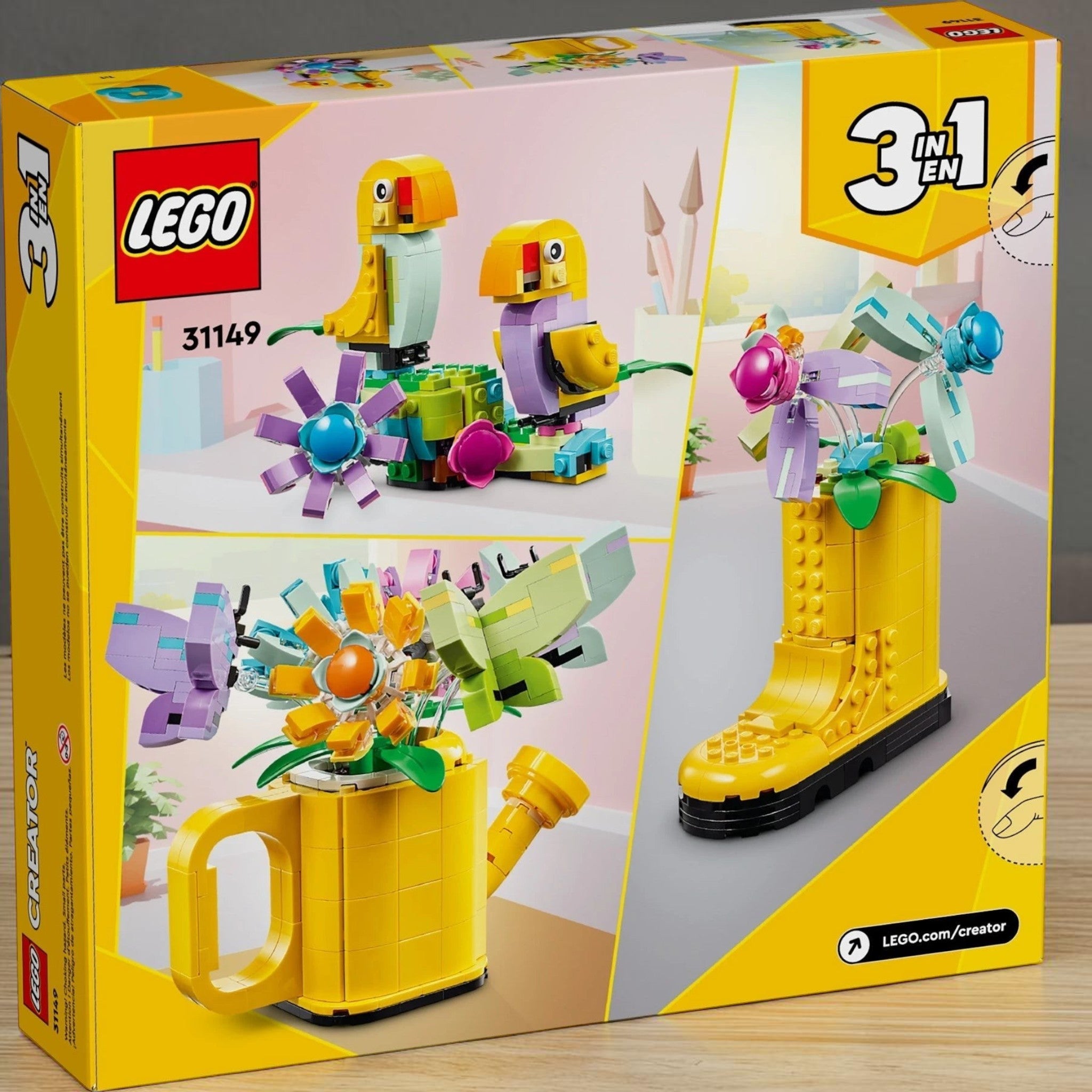 A Brick Apart LEGO Creator 3in1 Flowers in Watering Can set box showing models of a yellow watering can, boot, and birds.