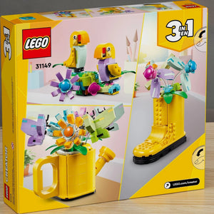 A Brick Apart LEGO Creator 3in1 Flowers in Watering Can set box showing models of a yellow watering can, boot, and birds.