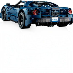 A Brick Apart LEGO Technic 2022 Ford GT model seen from the rear, showcasing the dark blue body and detailed taillights.