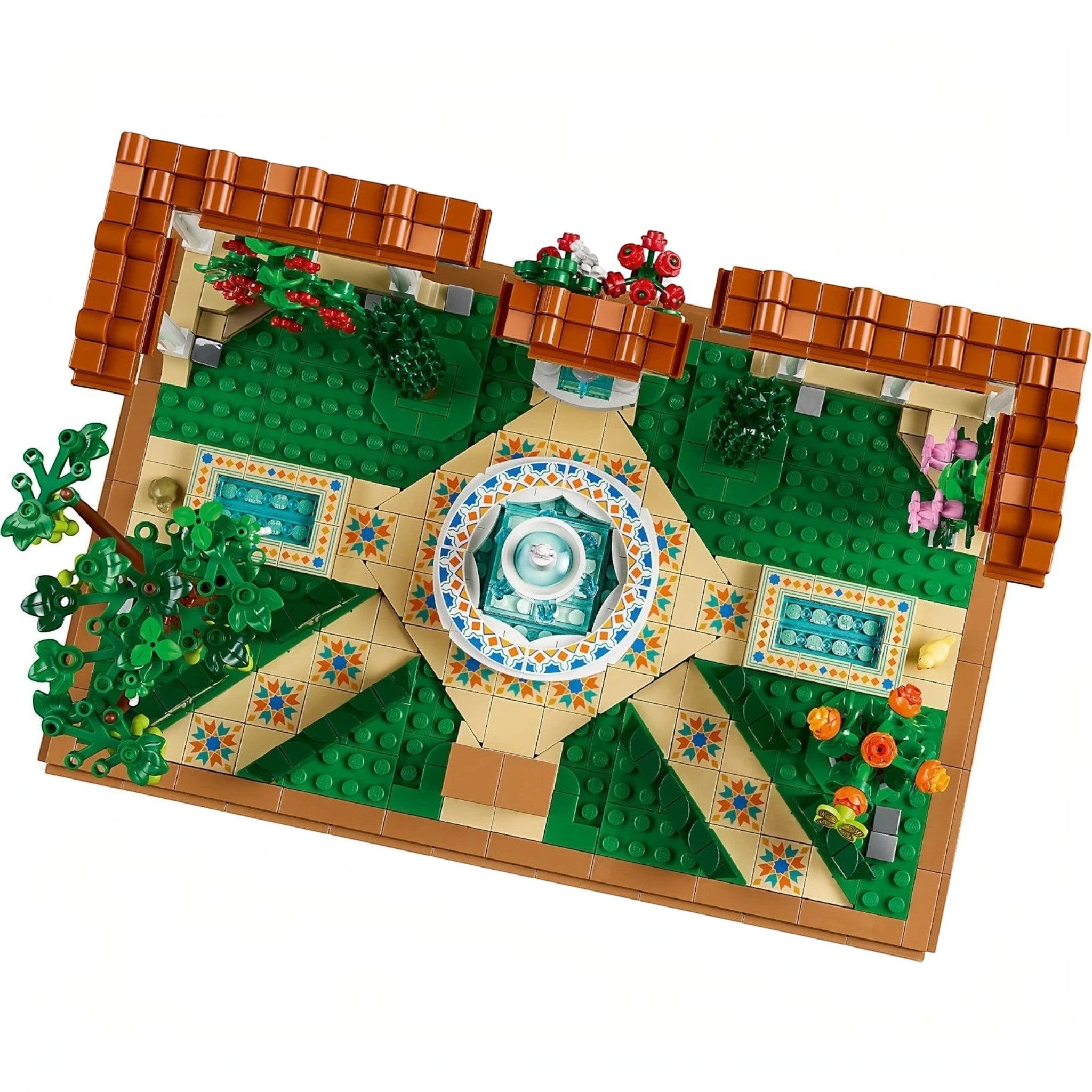 A Brick Apart LEGO Icons Fountain Garden building set with a tiered fountain, tiled pathways, and colorful flowers.