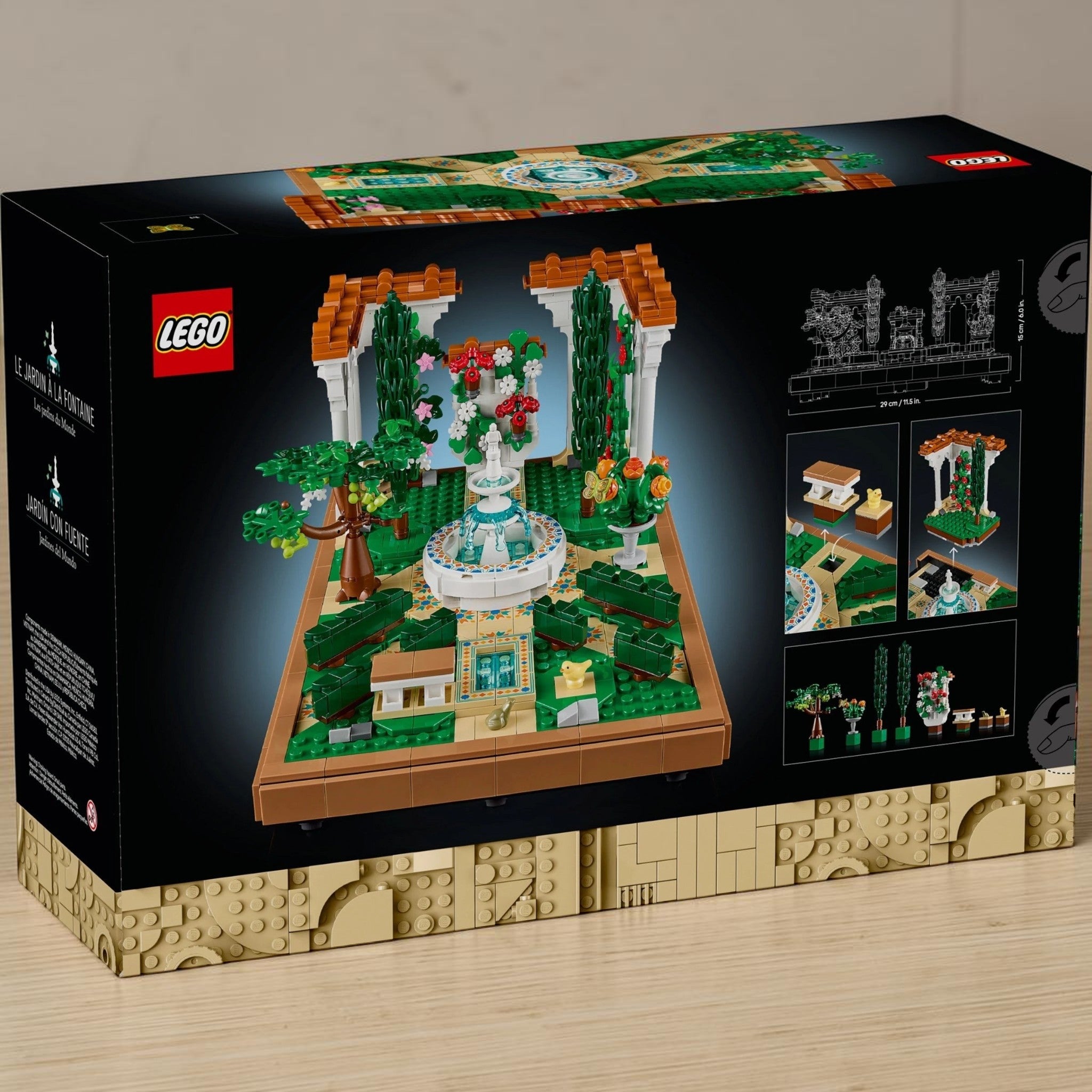 A Brick Apart LEGO Icons Fountain Garden building set box showing the completed tiered fountain and floral landscape.