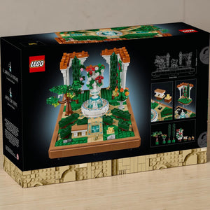 [lifestyle-shelf-box] A Brick Apart LEGO Icons Fountain Garden building set box showing the completed tiered fountain and floral landscape.