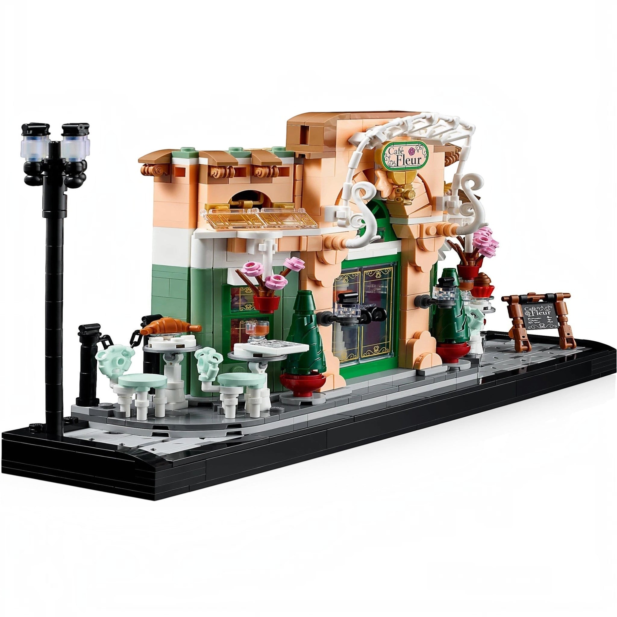 A Brick Apart LEGO Icons French Café model featuring a detailed bistro facade, outdoor seating, and a streetlamp.