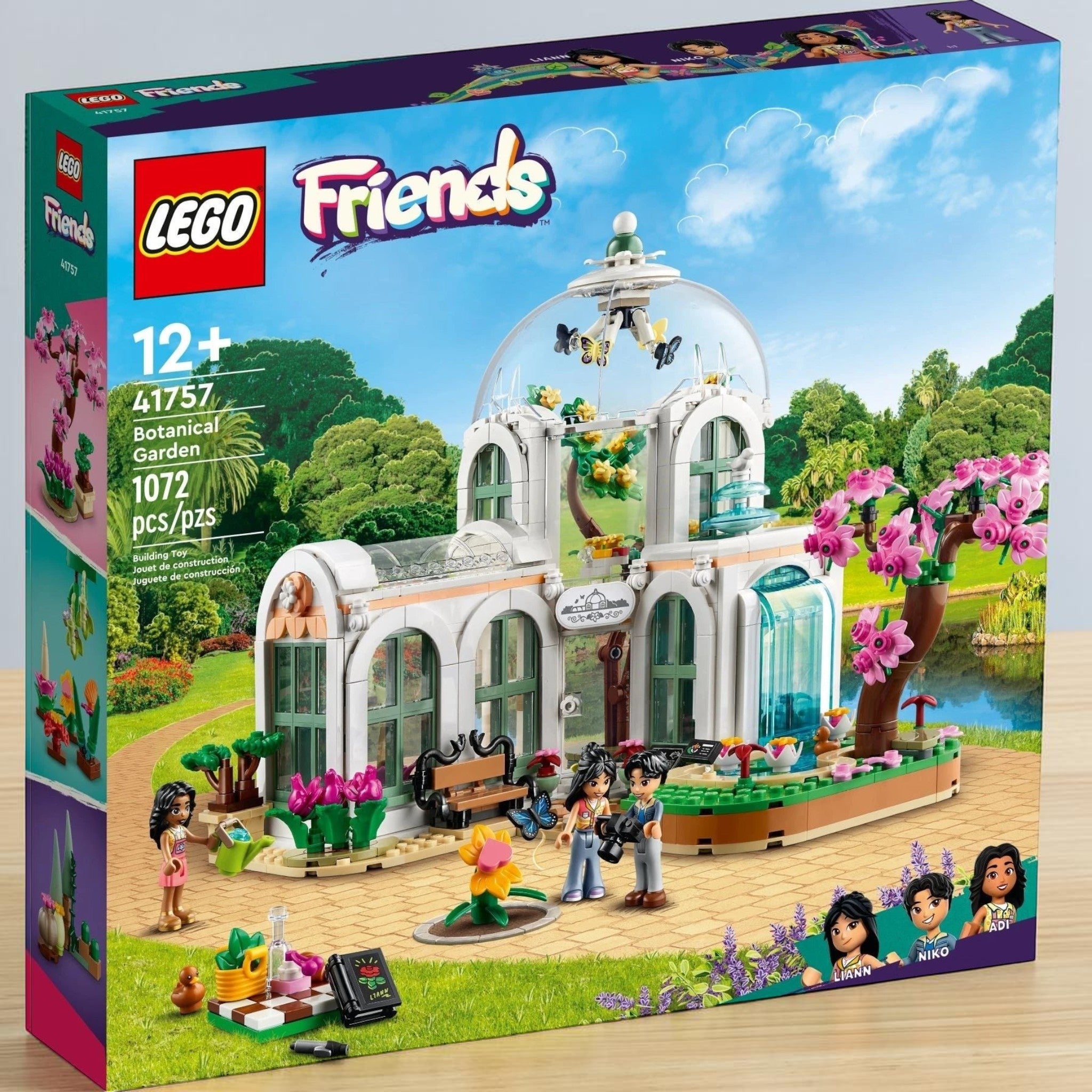 A Brick Apart LEGO Friends Botanical Garden set featuring a glass dome, exotic plants, and three mini-doll figures.