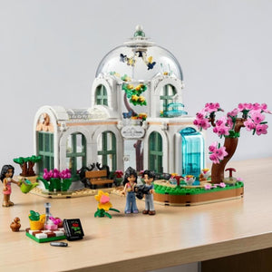 A Brick Apart LEGO Friends Botanical Garden set featuring a glass dome, exotic plants, and three mini-doll figures.