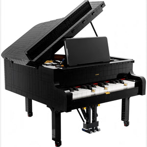 A Brick Apart LEGO Ideas Grand Piano set with a black brick-built body, open lid, and smartphone mounted on the keys.