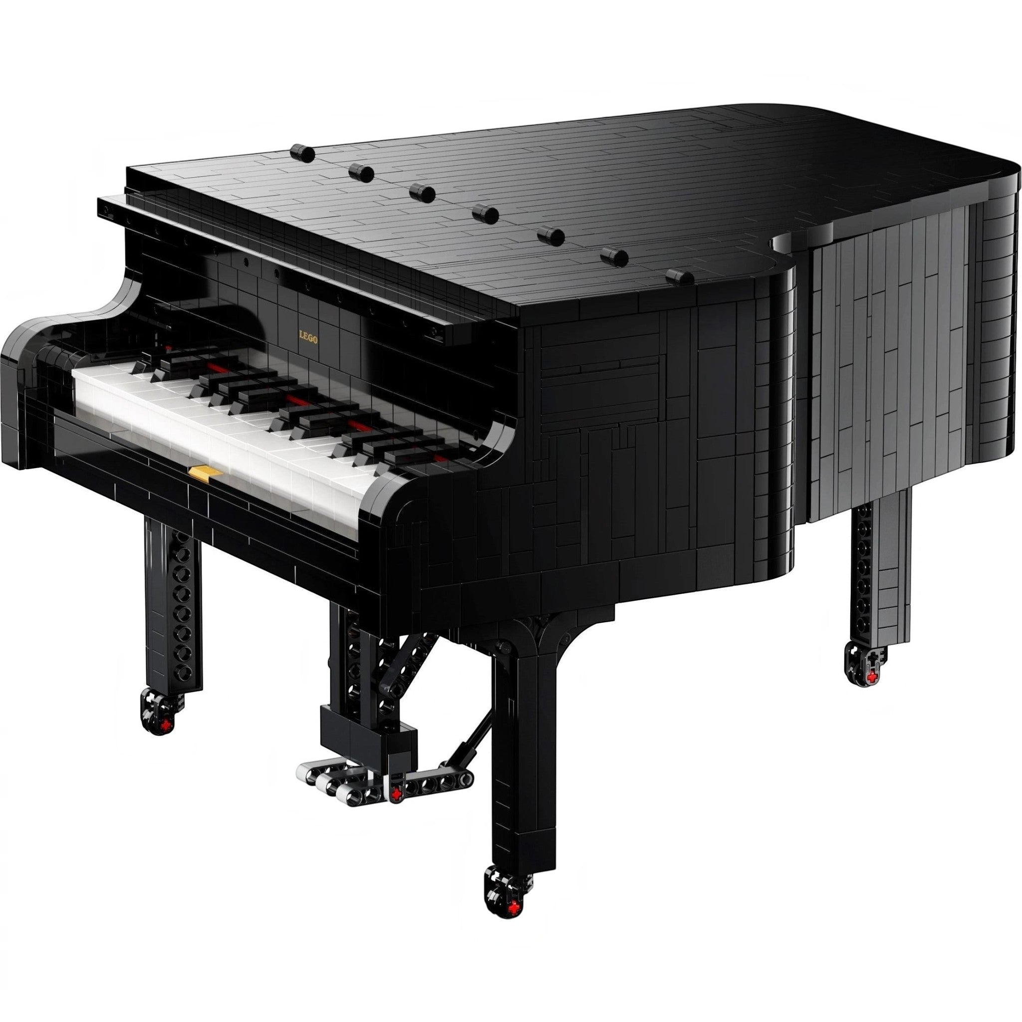 A Brick Apart LEGO Ideas Grand Piano model in black with a realistic keyboard, pedal, and detailed brick construction.