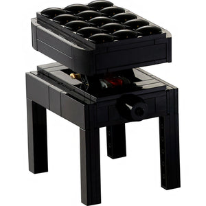 A Brick Apart LEGO Ideas Grand Piano height-adjustable black brick-built bench with a cushioned seat design.