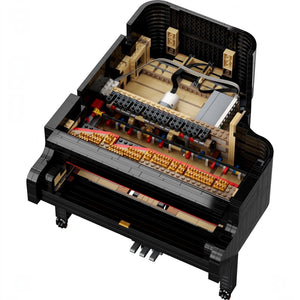 A Brick Apart LEGO Ideas Grand Piano showing the internal hammer action mechanism and electronic components