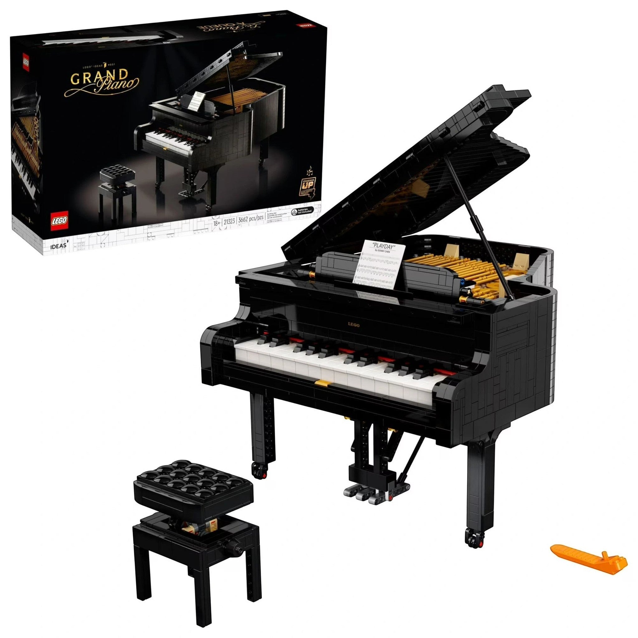 A Brick Apart LEGO Ideas Grand Piano set featuring a black brick-built concert piano, adjustable bench, and sheet music.