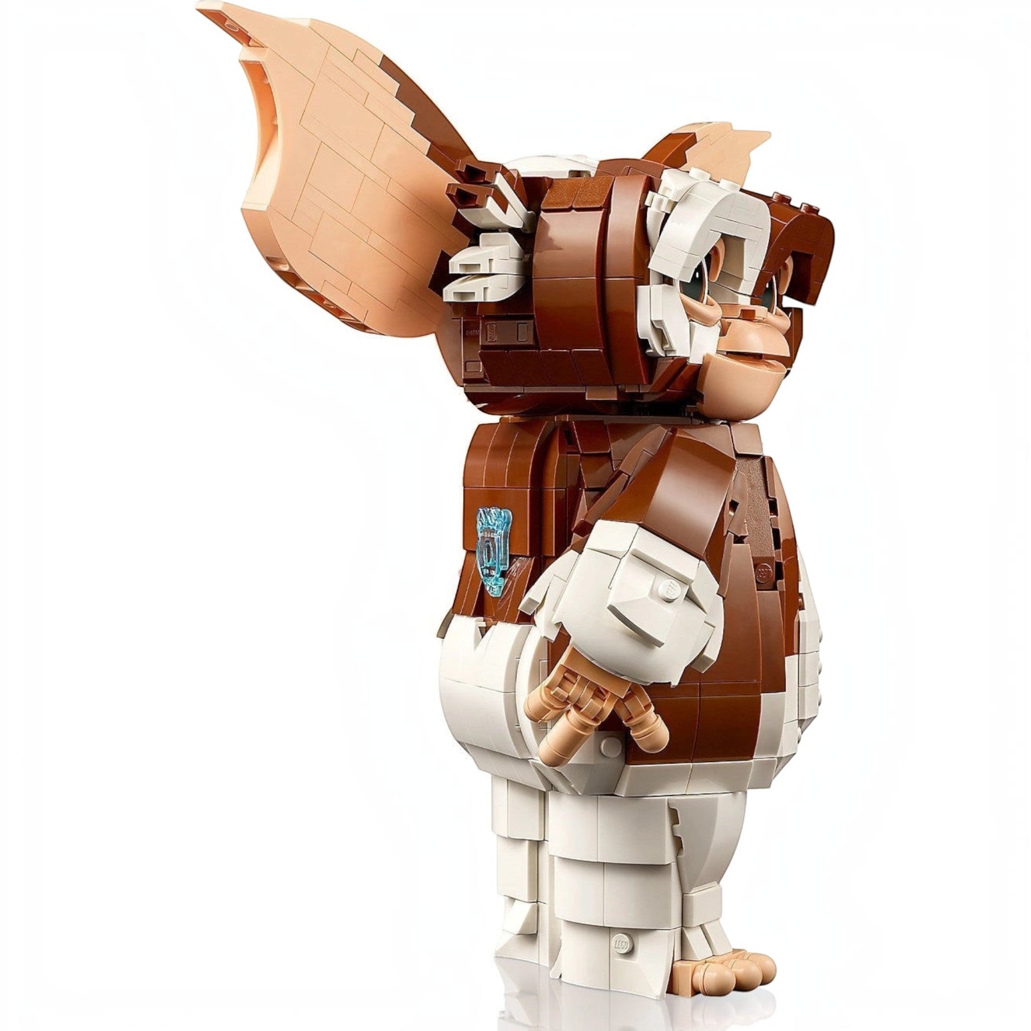 A Brick Apart LEGO Ideas Gremlins Gizmo posable figure showing side profile with brown and white brick details.