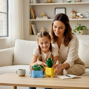 A Brick Apart LEGO Botanicals Happy Plants set with a mother and daughter building the dracaena and pilea plant figures.