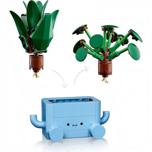 [built-detail] A Brick Apart LEGO Botanicals Happy Plants set featuring a buildable dracaena and pilea with a blue cartoon face pot.