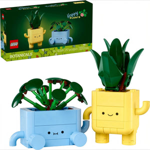 A Brick Apart LEGO Botanicals Happy Plants set featuring a green dracaena and pilea in yellow and blue cartoon pots.