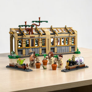 A Brick Apart LEGO Harry Potter Herbology Class set featuring a greenhouse, minifigures, and Mandrake plant toys.