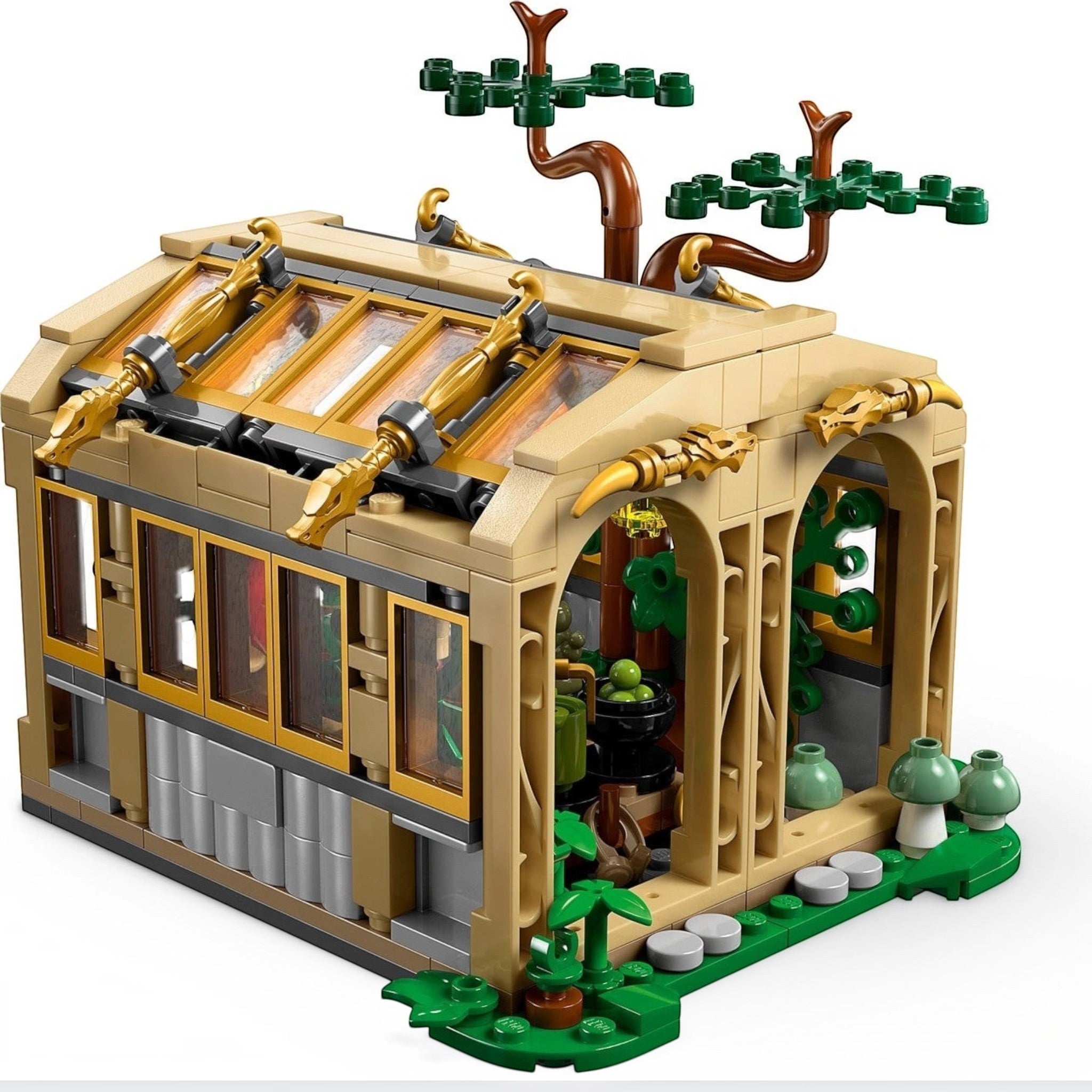 A Brick Apart LEGO Harry Potter Herbology Class greenhouse set featuring tan walls, glass windows, and magical plants.
